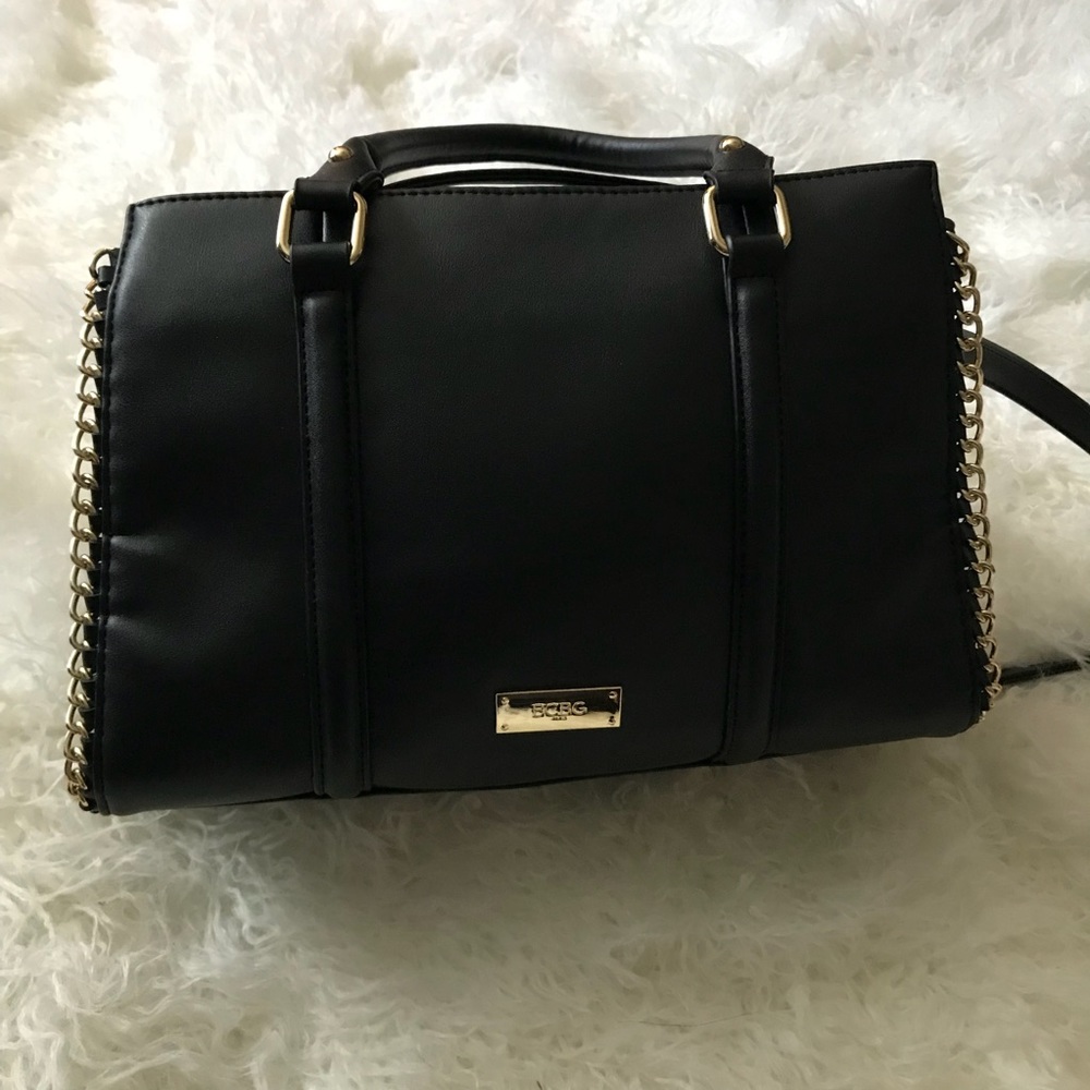Black BCBG purse with gold embellishments